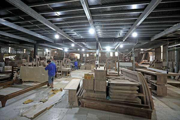 Factory of a walnut wood furniture company in Vietnam