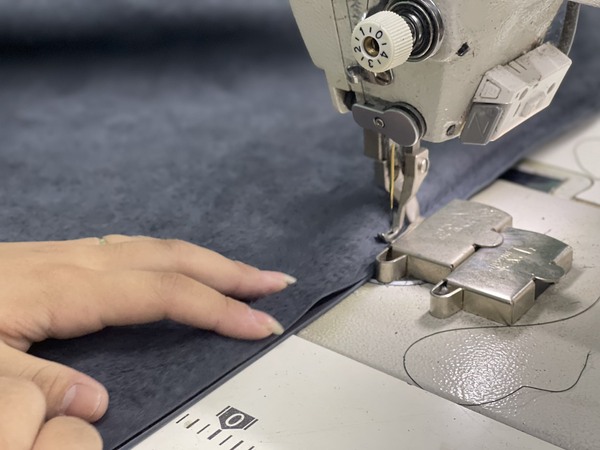 The QA staff at Furniture are meticulous in the upholstery sewing process.