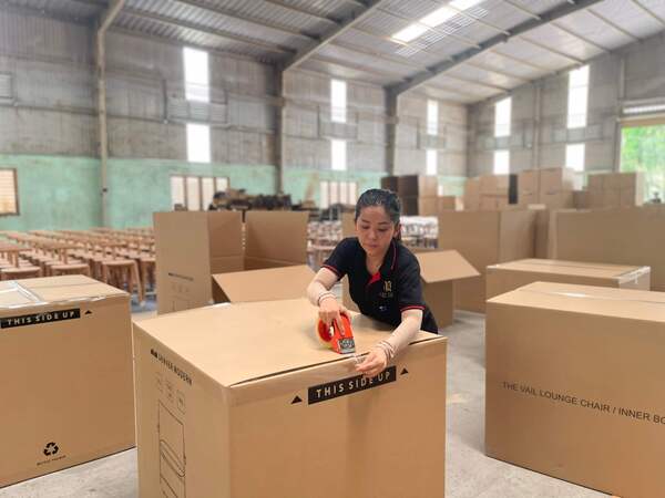 Product packaging team at QA Furniture's factory