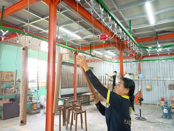 The workspace of QA Furniture's oak furniture manufacturing factory in Binh Duong