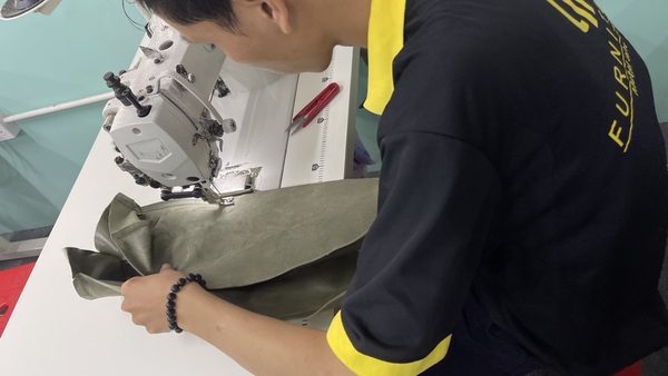 The employees at QA Furniture are meticulous in every upholstery stitching detail.
