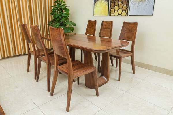 Walnut wood has become popular in dining table designs