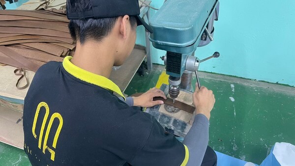 Workers at upholstery company QA Furniture